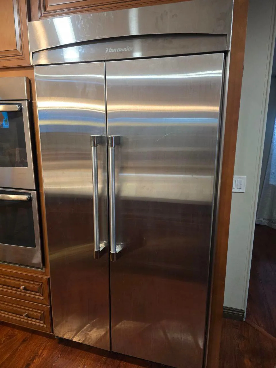 Thermador built-in refrigerator during an ice and water dispenser repair